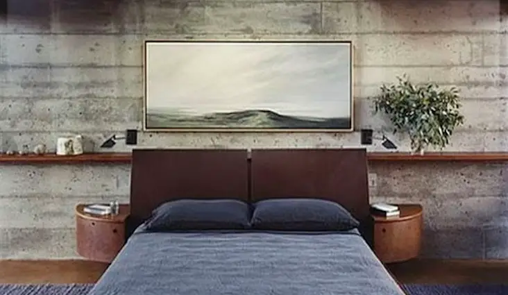 chambre style masculin exemple decoration tête de lit cuir revêtement mural brut béton ciment bois élégance