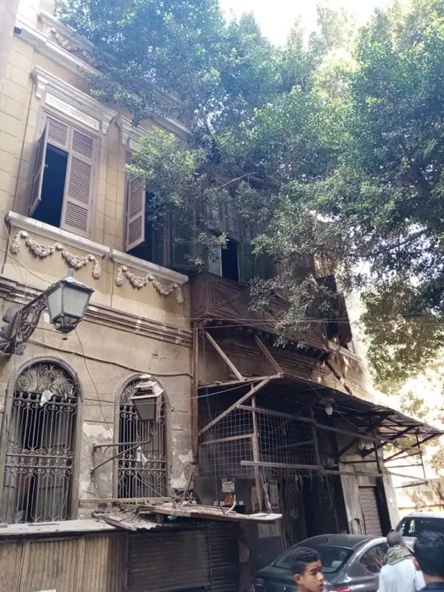 visite souk caire egypte façade maison ancienne balcon volet pierre et bois