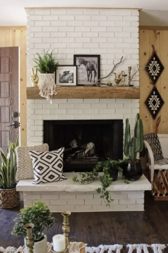peinture cheminee brique exemple blanc bois plantes cadres