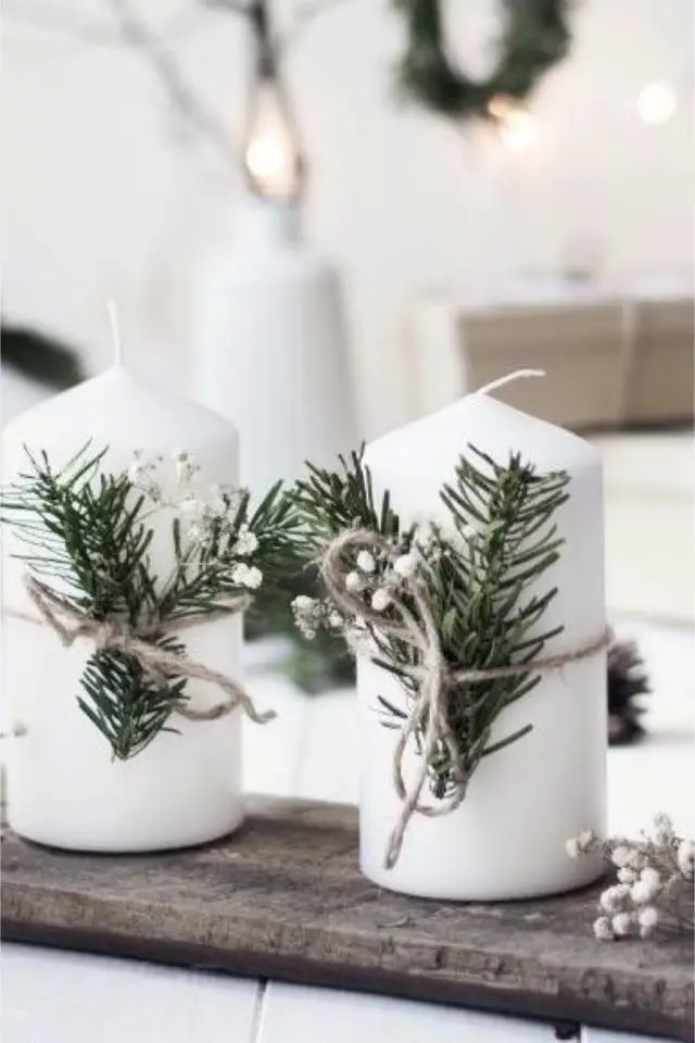 deco table noel nature exemple bougies blanches branche de cyprès ficelle 