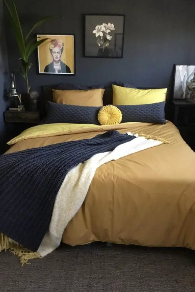 decor masculin materiaux couleurs exemple chambre à coucher noire linge de lit ocre chaleureux contraste naturel
