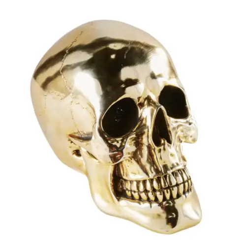 ou trouver deco gothique statuette crâne tête de mort métal laiton doré