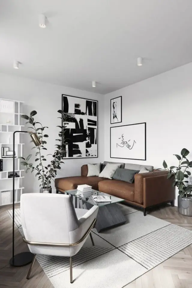 salon sejour japandi exemple minimalisme épuré canapé en cuir couleur sobre blanc gris élégant
