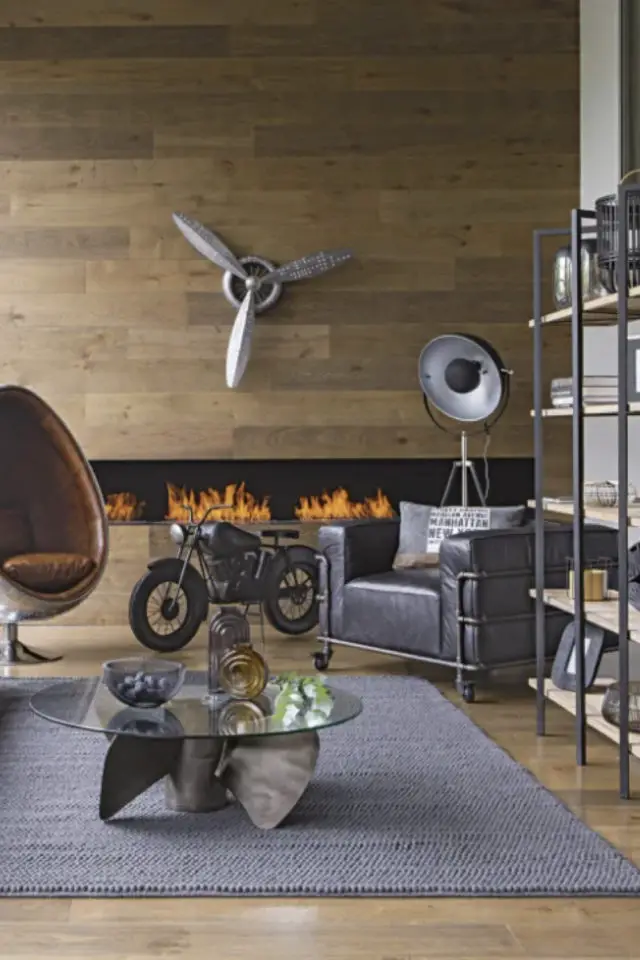 interieur masculin mobilier exemple salon maisons du monde revêtement bois bibliothèque fauteuil en cuir noir