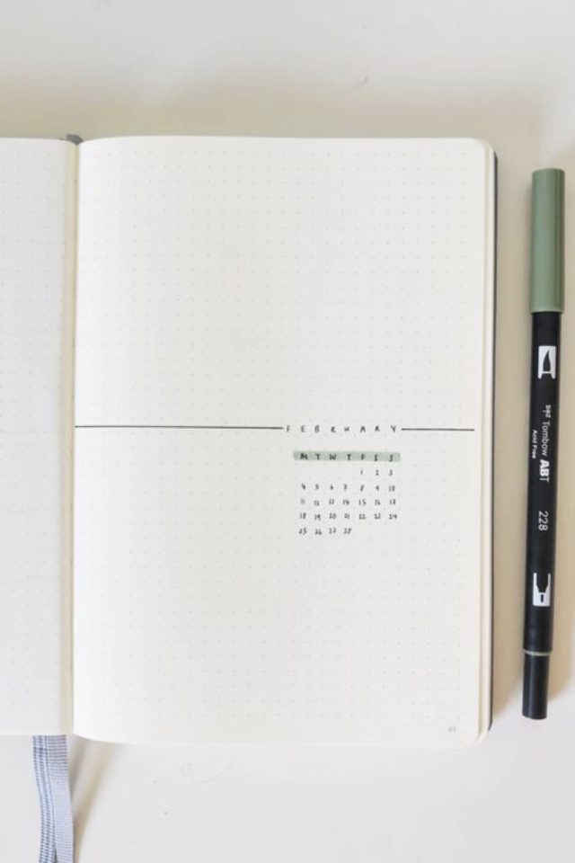 bullet journal minimaliste exemple calendrier ligne trait de couleur pastel vert