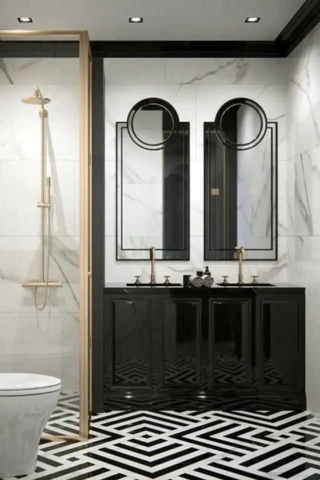 petite salle de bain meuble double vasque miroir ambiance élégante marbre noir style art deco arrondi