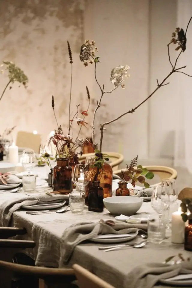 decor table nouvel an nature couleur naturelle blanc vert marron vase en verre coloré branche