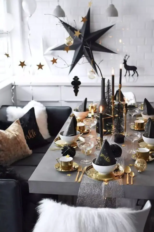 decoration nouvel an noir et or grande étoile noire en papier bougies couvert doré