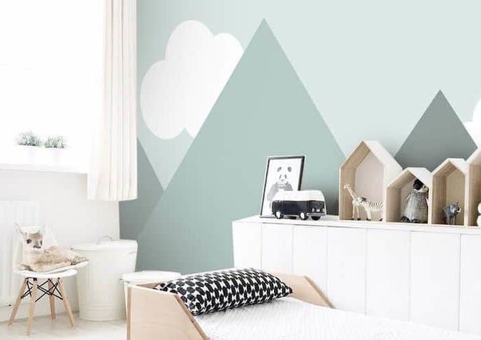 chambre enfant style nature decoration fresque murale montagne moilier bois et blanc ambiance moderne et simple