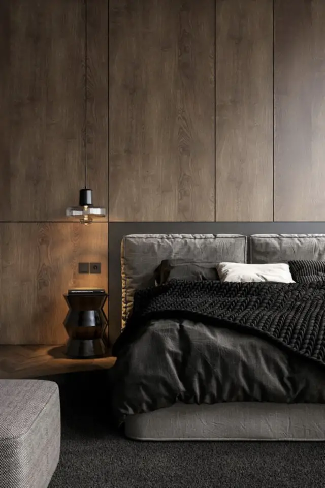 chambre a coucher style masculin exemple revêtement mural bois brut tête de lit tissus parure linge gris et noir