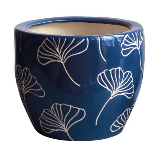 mobilier vintage cache pot plantes vertes pot de fleurs bleues avec motif