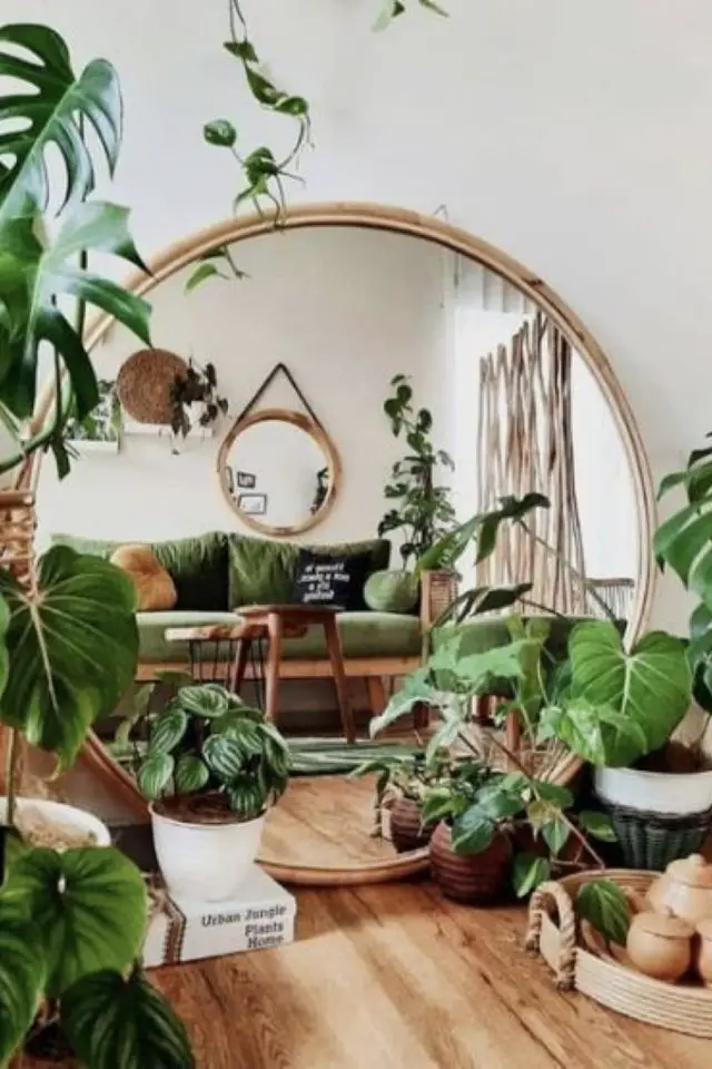 interieur salon moderne plantes jungle arche parquet canapé vert