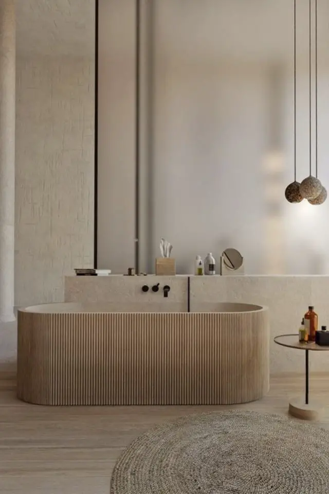 exemple salle de bain minimaliste et cosy baignoire îlot en bois verre fumé intimité design épuré