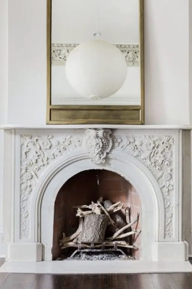 foyer cheminee cintre exemple arche marbre travaillé élégant classique chic