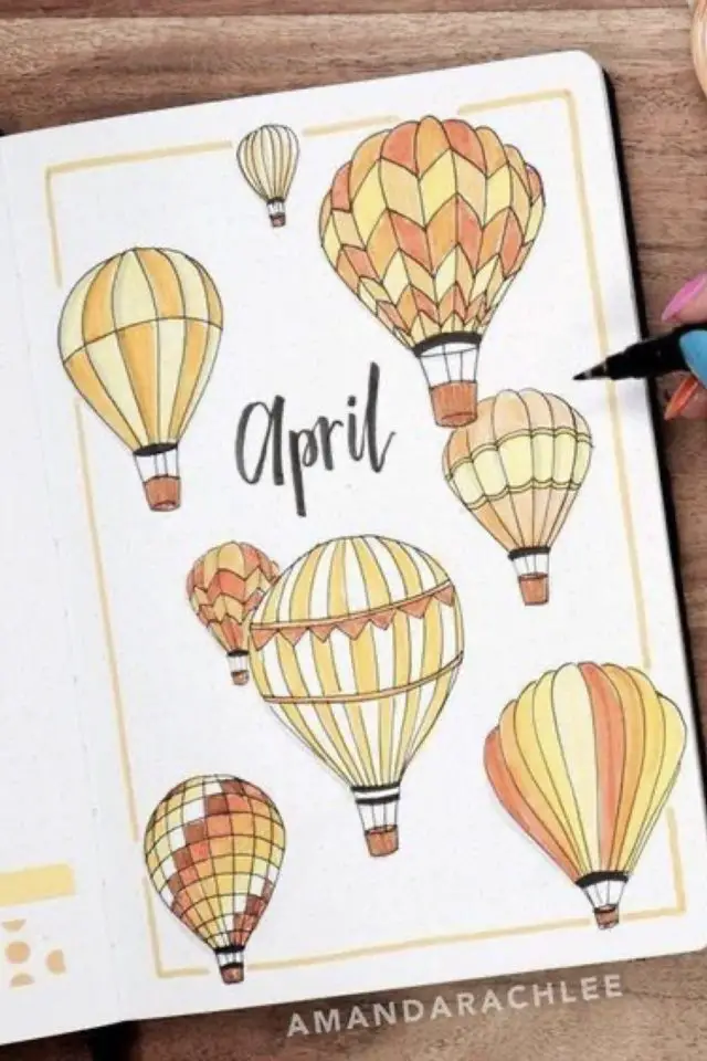 bullet journal avril exemple dessin page de garde montgolfières