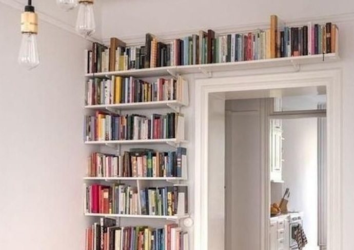 mur bibliotheque blanche rangement livres élégant salon séjour