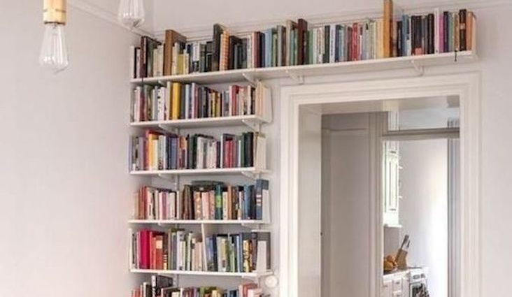 mur bibliotheque blanche rangement livres élégant salon séjour