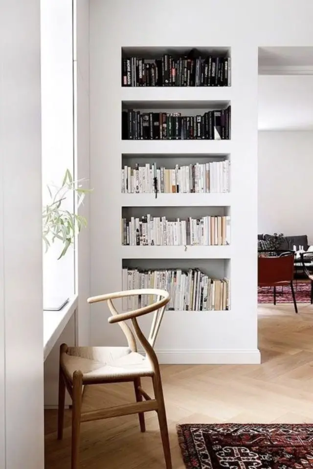 simplicite bibliotheque blanche salon sejour élégante rangement mur minimaliste