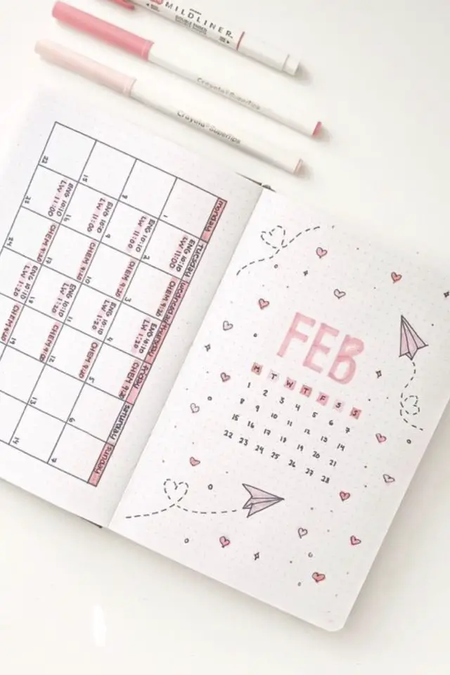 bullet journal saint valentin calendrier doodle avion en papier petits coeurs rose et blanc