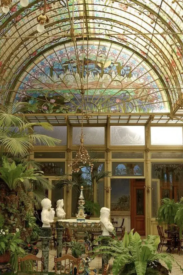 cest quoi art nouveau jardin d'hiver véranda en métal et vitraux lumière plantes exotiques