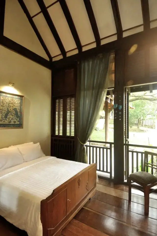 dormir habitat traditionnel malaisie voyage chambre à coucher adulte voilage décor sobre maison asie du sud-est