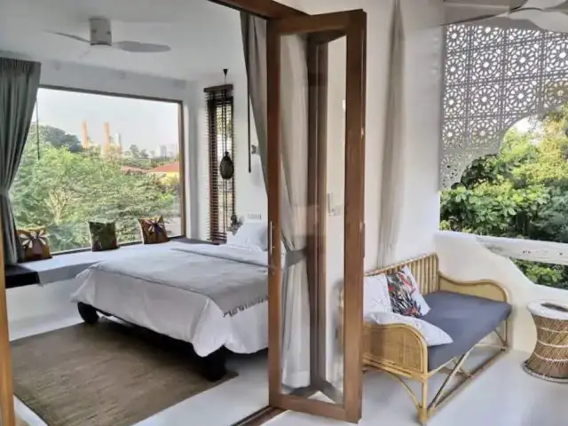 hebergement voyageur exception thailande Bangkok chambre à coucher avec balcon extérieur couvert