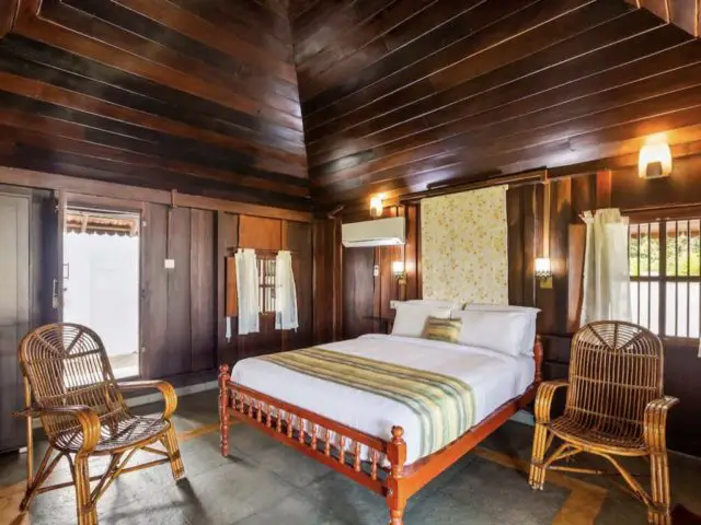 voyage inde kerala hebergement luxe chambre à coucher traditionnelle style colonial