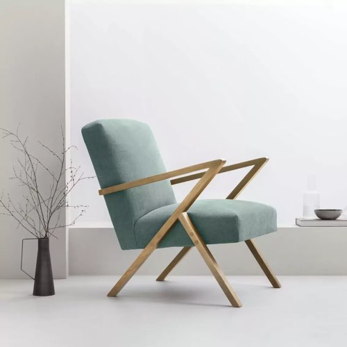 chambre deco design couleur vert sauge Fauteuil en chêne et tissu vert d'eau