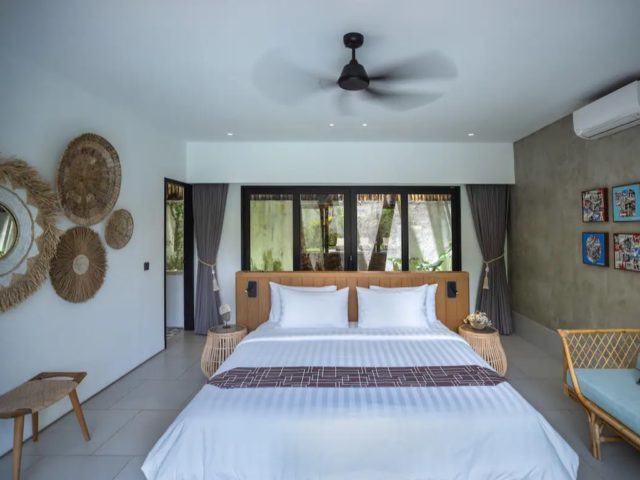 dormir bali indonesie vacances haut de gamme jolie chambre à coucher blanche déco en bois