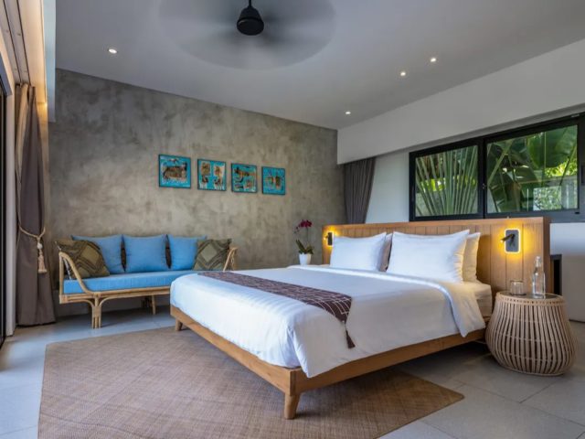dormir bali indonesie vacances haut de gamme décor chambre adulte bois et pierre