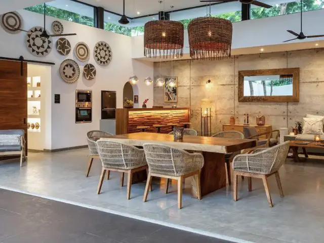 villa a louer vacances uniques sri lanka espace salon salle à manger avec bar décor bohème chic bois cannage bambou fibres naturelles