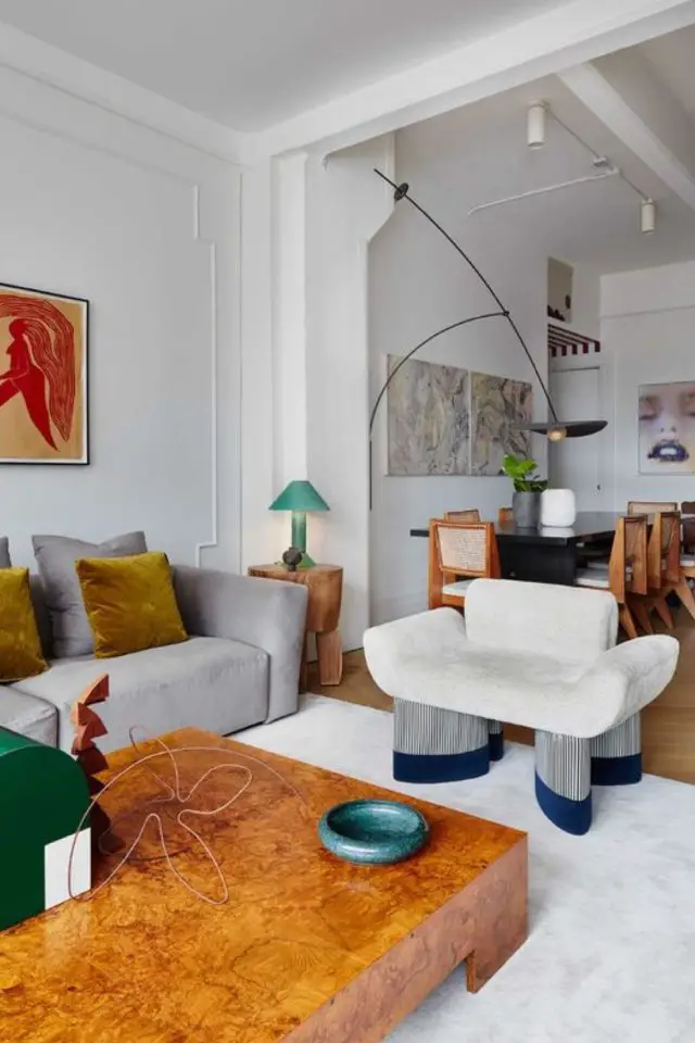 decor vintage moderne exemple espace de vie ouvert salon salle à manger canapé gris fauteuil design