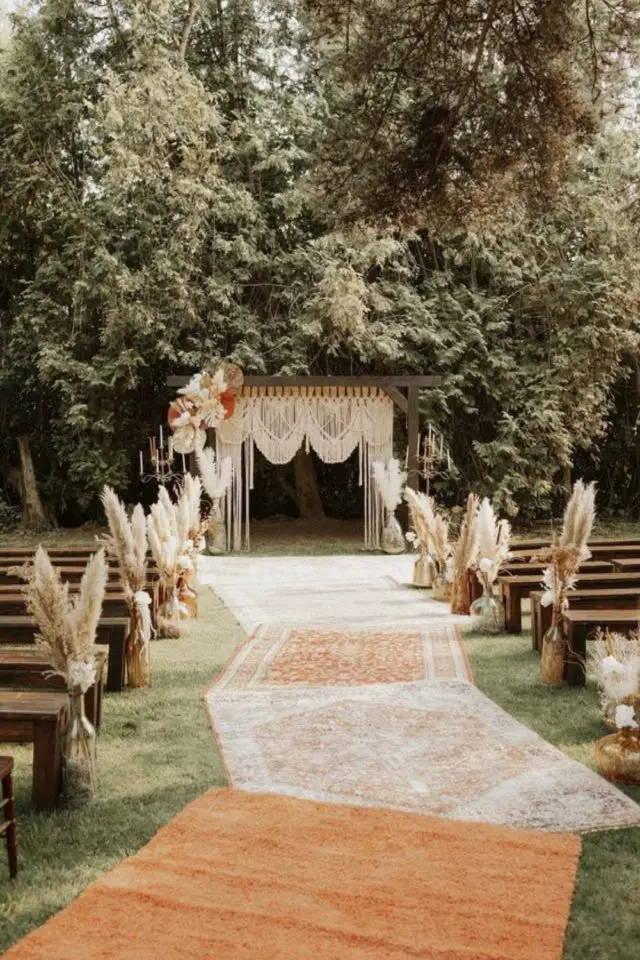 theme mariage boheme decoration cérémonie en extérieur tapis macramé arche
