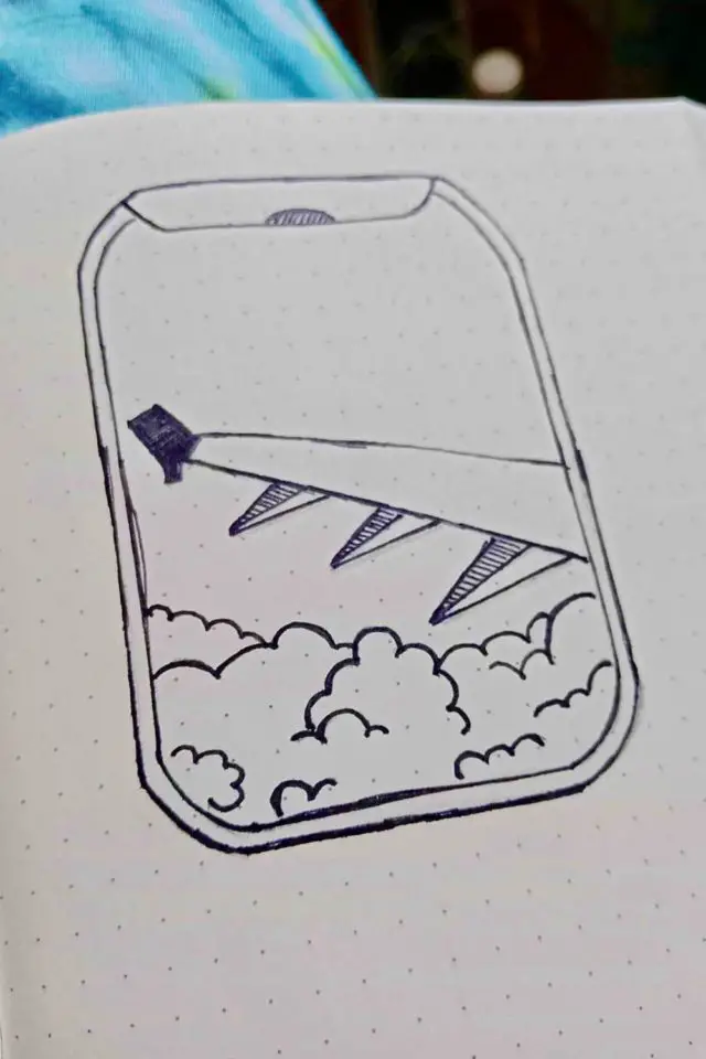 journal de voyage 2023 dessin doodle avion hublot noir et blanc feutre