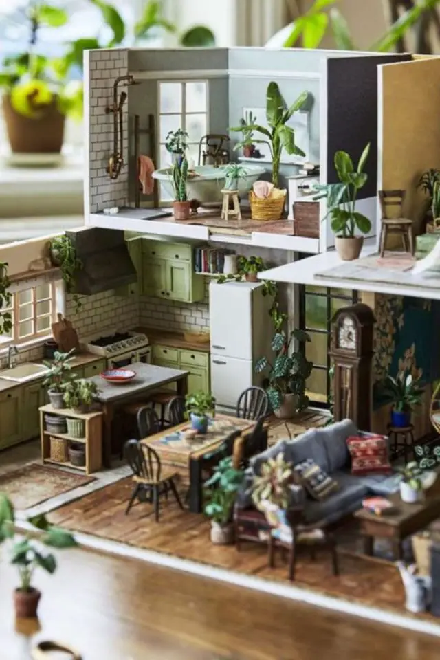 maison miniature loisirs creatifs adulte construction 2 niveaux rez de chaussée et étage plantes vertes pièces de vie