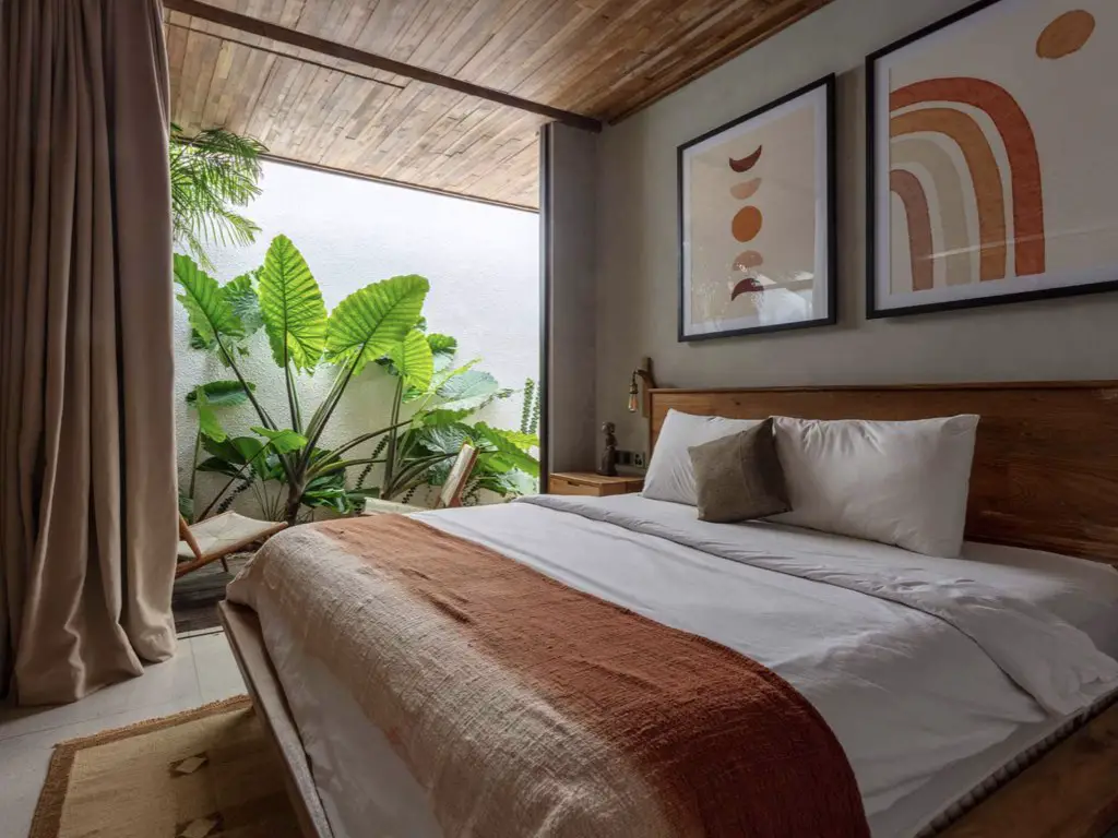 maison ouverte sur exterieur nature plantes tropicale extérieur chambre adulte moderne