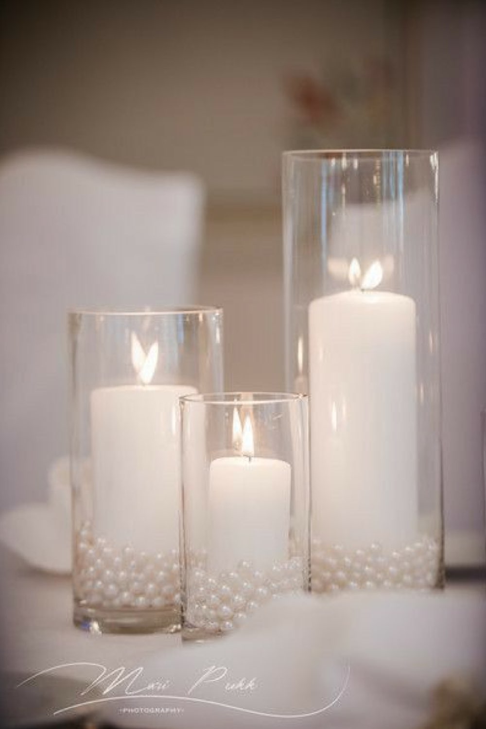  mariage en hiver deco a copier centre de table vase transparent bougies blanche perles