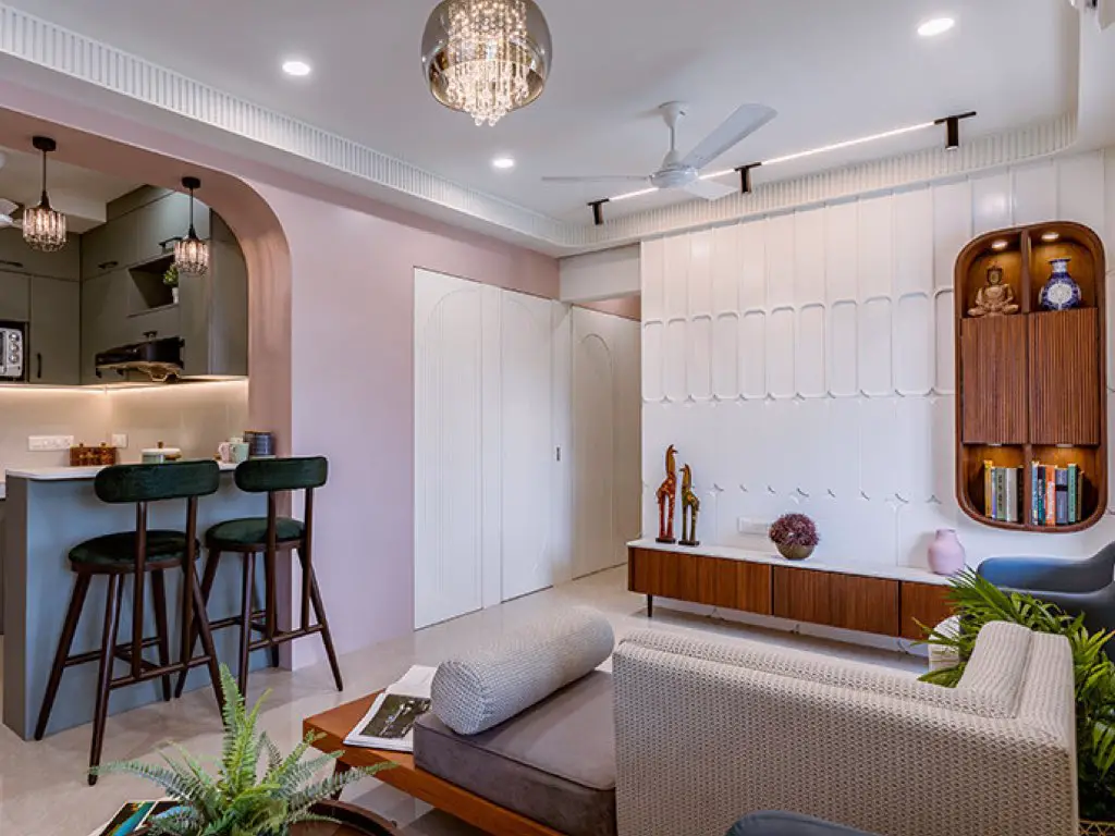 studio appartement decor moderne chic cuisine ouverte sur le salon séjour couleur rose vert blanc élégant