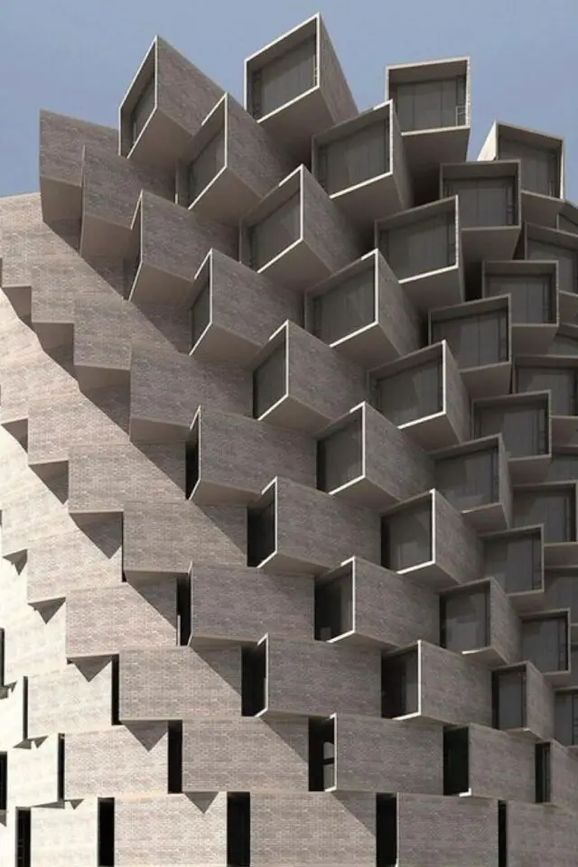 exemple construction architecture brutalisme succession de cellule de béton et de vitres la forme suit la fonction