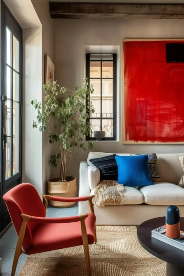 creer deco interieure originale et tendance touche inattendue de rouge salon séjour tableau peint fauteuil chic et élégant