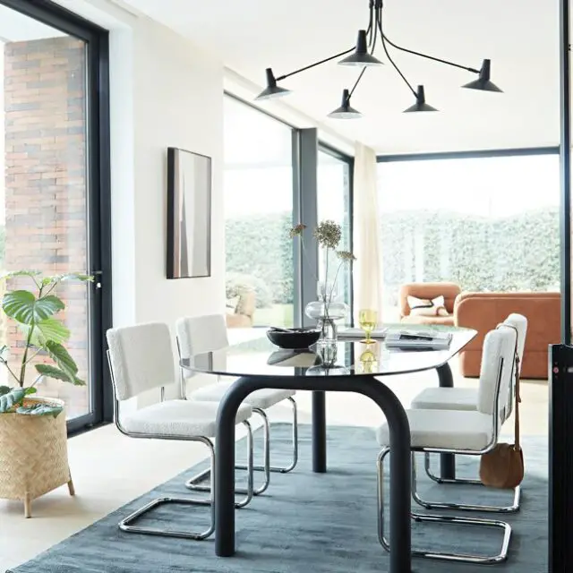 Table verre fumé et acier oblongue ovale design