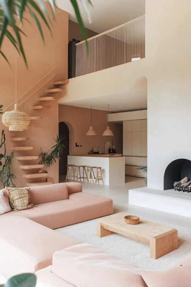 jolie décoration de salon photo grand espace ouvert cuisine cheminée couleur douce et naturelle terracotta rose blanc esprit méditerranéen chaleureux 