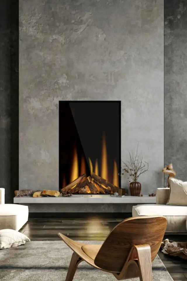 cheminée électrique simple épuré minimaliste élégant mur en béton ciré modèle encastré salon moderne et chic 