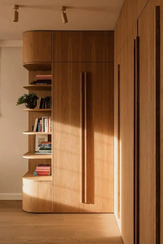 photo hall d'entrée de maison aménagement sur mesure meuble d'angle avec grande portes étagère et angles arrondis chaleureux et élégant photo hall d'entrée de maison aménagement sur mesure meuble d'angle avec grande portes étagère et angles arrondis chaleureux et élégant