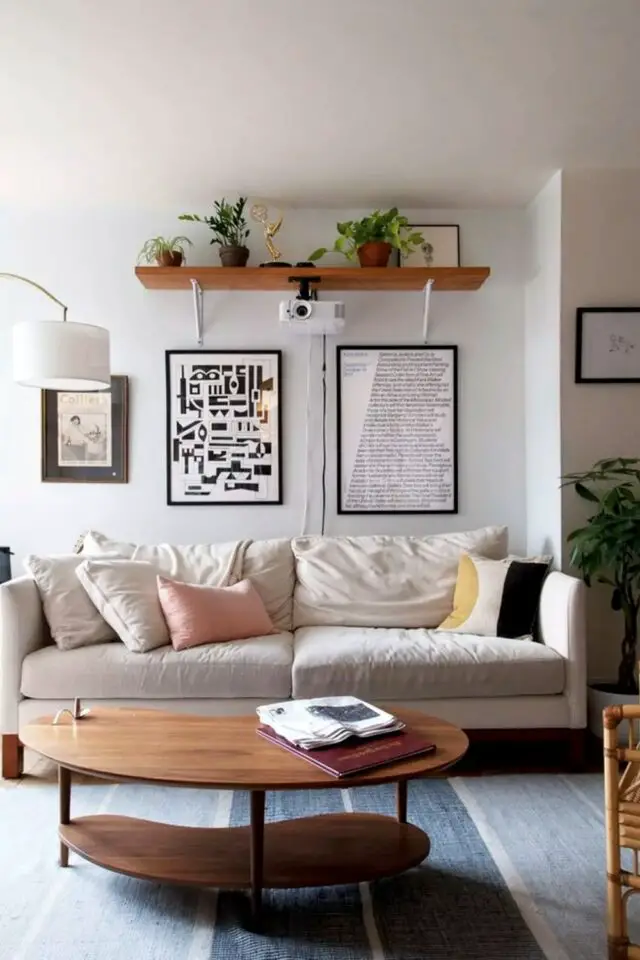 Idée déco salon appartement petit canapé familial rétro-projecteur étagère murale plante liseur grand cadre moderne Idée déco salon appartement petit canapé familial rétro-projecteur étagère murale plante liseur grand cadre moderne