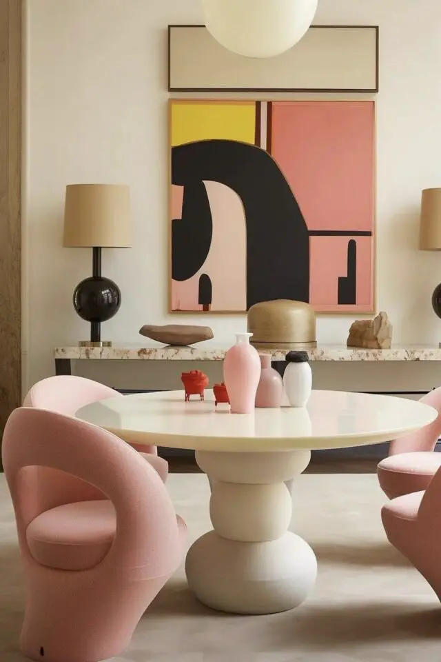 idée déco camaïeux rose et blanc salle à manger design table ronde fauteuil coloré tableau abstrait accroché au mur idée déco camaïeux rose et blanc salle à manger design table ronde fauteuil coloré tableau abstrait accroché au mur