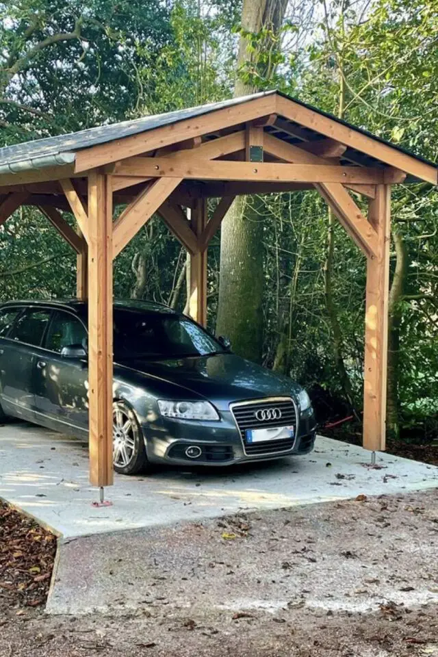 carport en bois abri indépendant dalle béton toit en tôle aménagement parking couvert