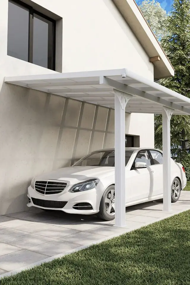 exemple carport adossé côté maison petite terrasse une voiture berline 