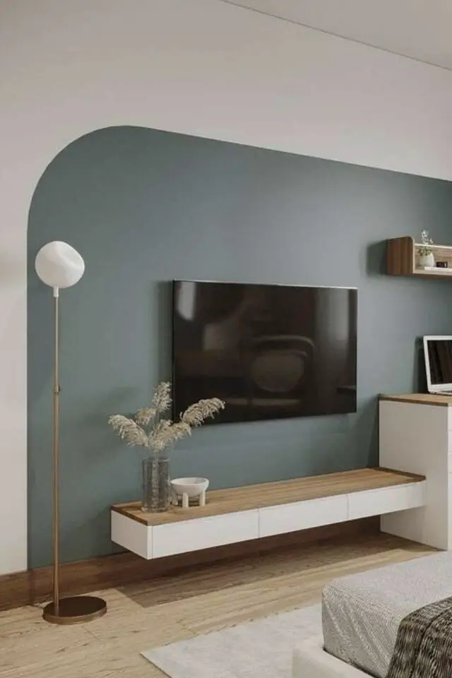Peinture murale originale pour délimiter l'espace TV dans la chambre parentale couleur bleu arrondi 