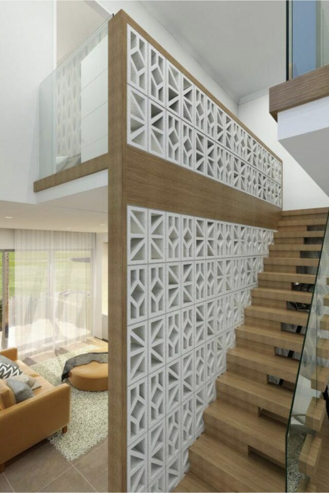 séparer escalier ouvert de la pièce de vie avec un mix claustra béton peint en blanc et un habillage bois séparer escalier ouvert de la pièce de vie avec un mix claustra béton peint en blanc et un habillage bois